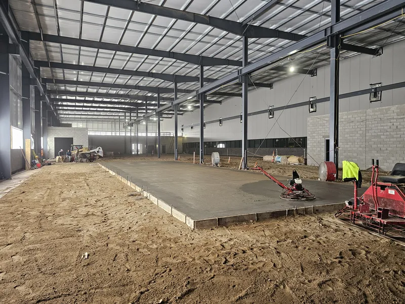 Commercial warehouse concrete slab during placement